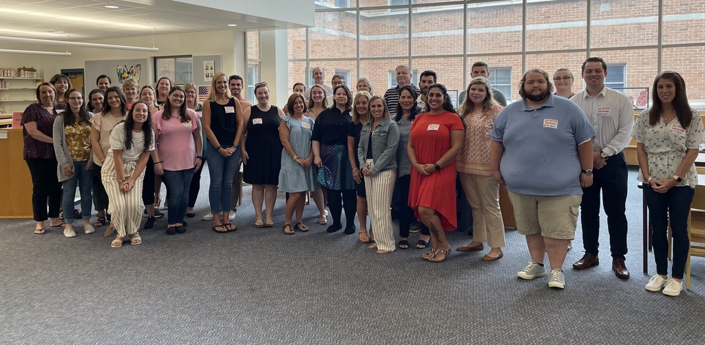 A large group of teachers and staff