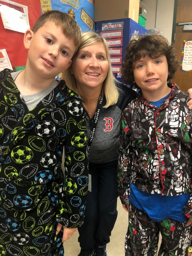 teacher and students dressed in comfy clothes at school 